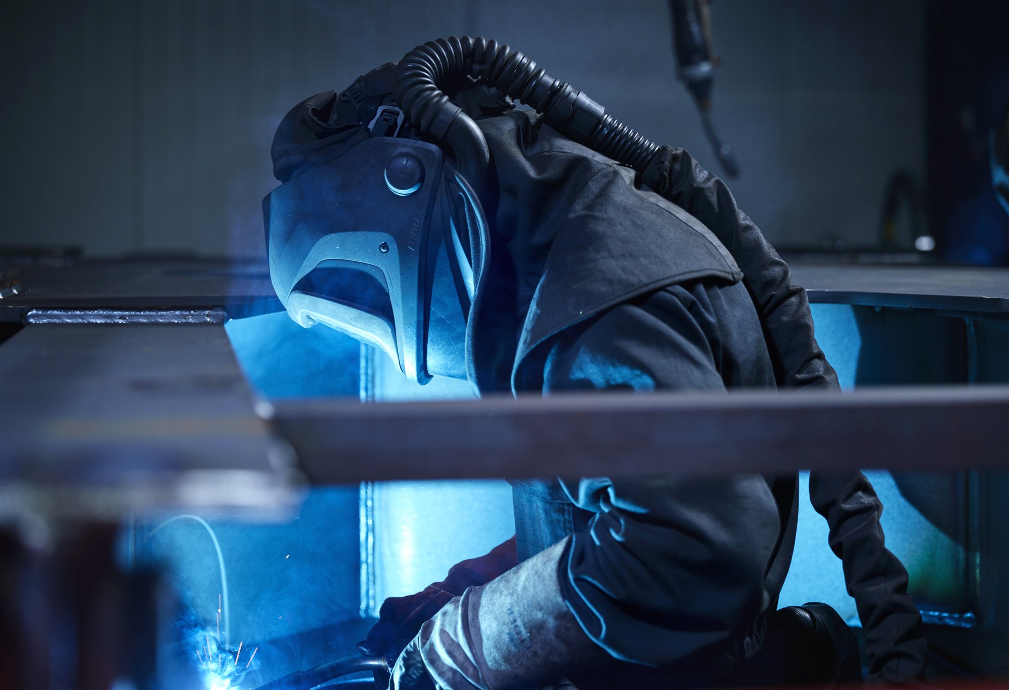 man-welding-in-welding-gear